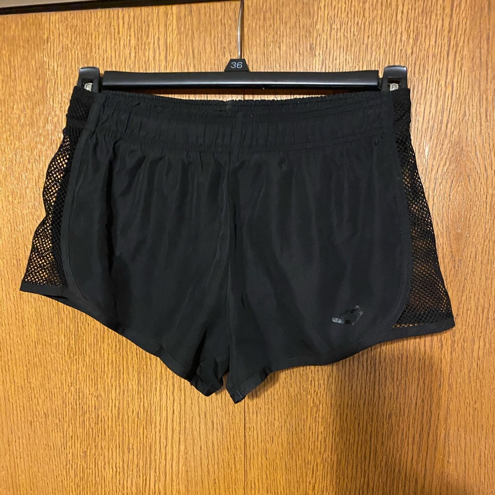 Size Small-Pony black athletic shorts with mesh on the sides.
